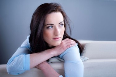 Smith Surgery-Woman resting on arms looking out